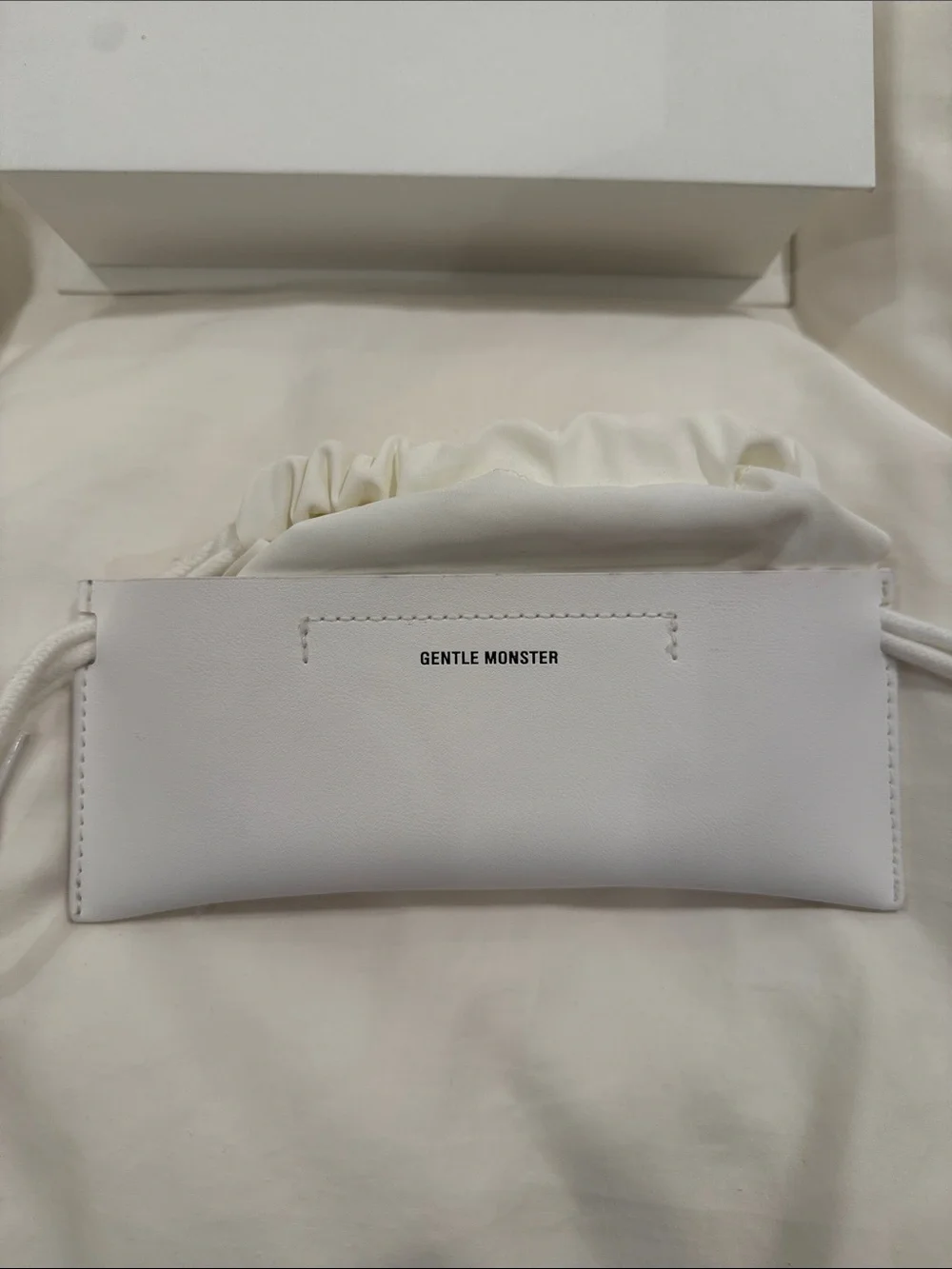 GENTLE MONSTER White Drawstring Sunglass Pouch